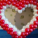 Big heart made of balloons for a wedding