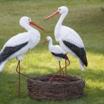 Stork figurines for the garden