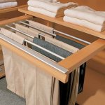 Pull-out trouser compartment in the wardrobe